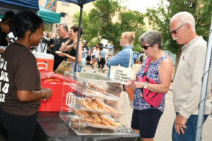 The Cedar Rapids Downtown Farmers Market draws about 12,000 people weekly.