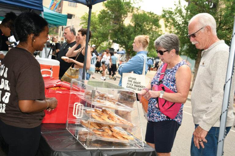 The Cedar Rapids Downtown Farmers Market draws about 12,000 people weekly.