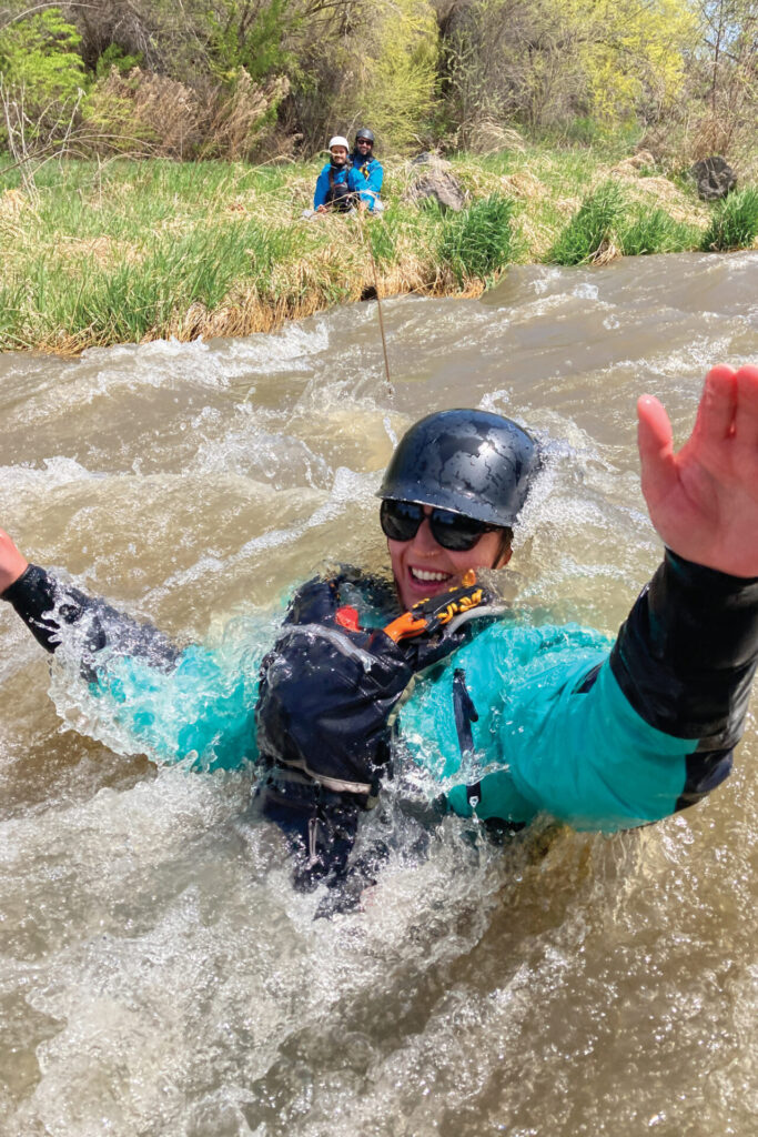 A woman floats through a whitewater rapid as part of the College of Southern Idaho Outdoor Recreation Leadership program.