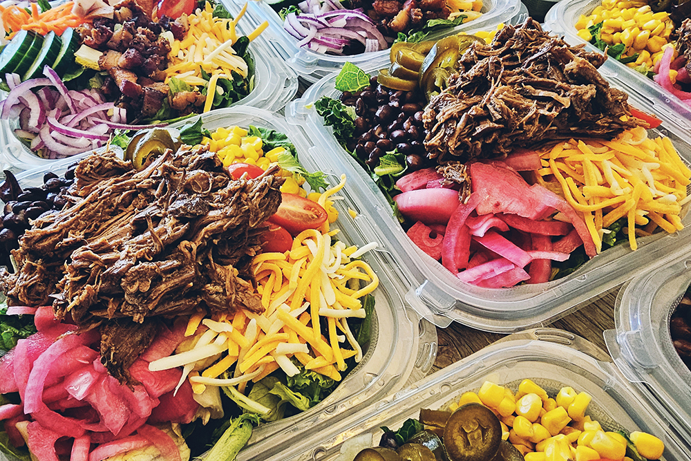 Salads topped with meat at Creative Cravings Food Truck in Twin Falls, Idaho.