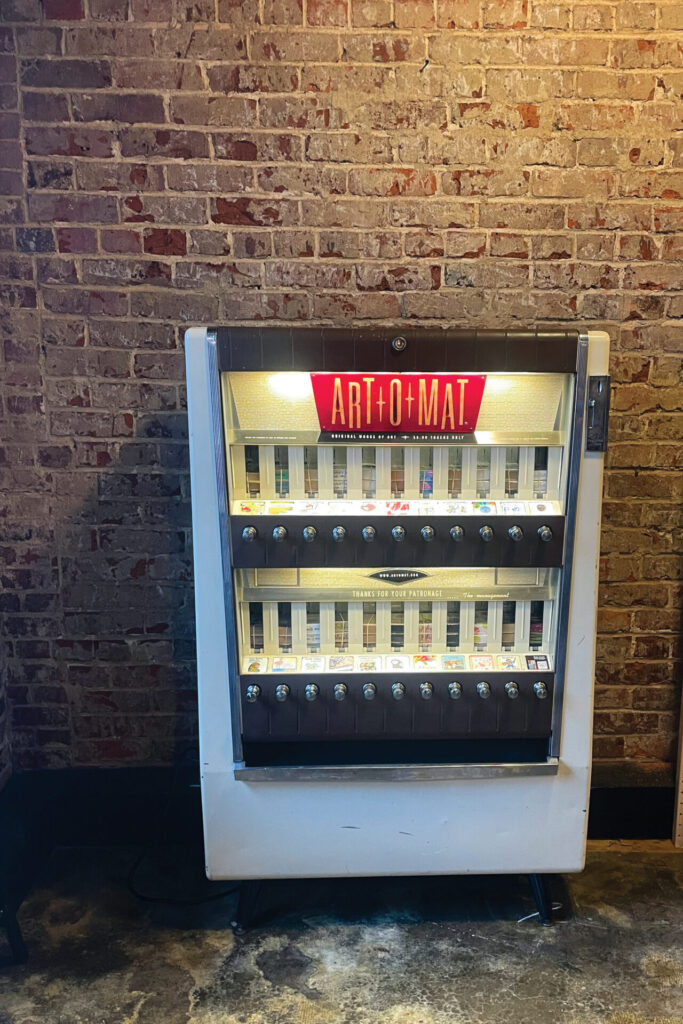 Delurk Gallery in Winston-Salem is home to one of 200 Art-O-Mat machines – retro cigarette vending machines revamped to dispense cool pocket-sized souvenirs. 
