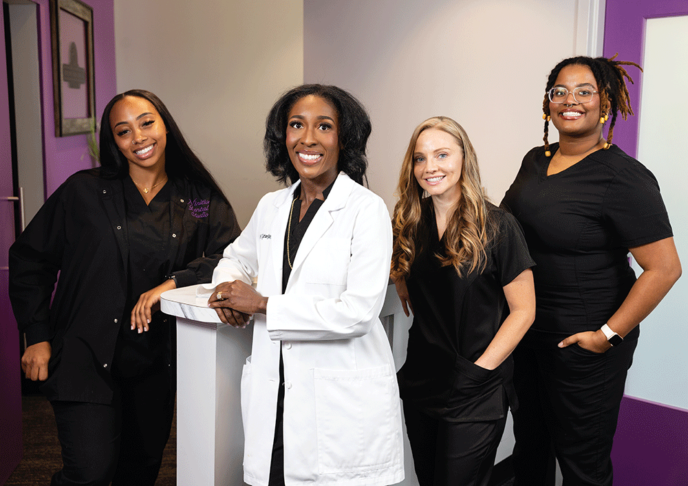 Dr. Tiffanie Garrison-Jeter, owner of Definition Dental and Wellness Spa, with her staff
