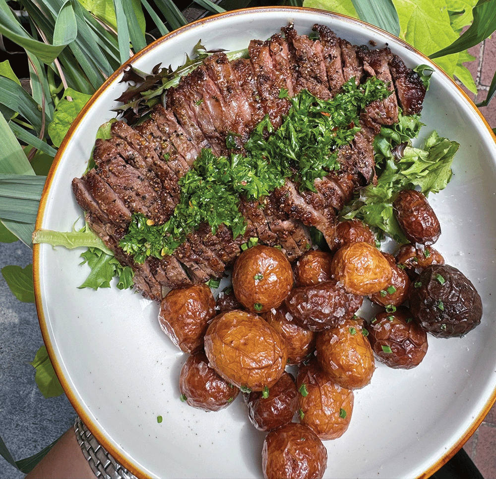 Whiskey Alley Saloon serves upscale saloon fare like steak and potatoes.