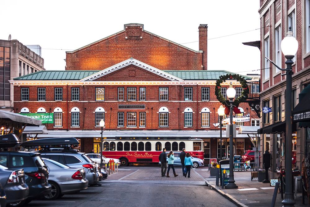 Roanoke, Virginia, US - January 5, 2017: The City Market Building in historic downtown Roanoke, a few people in the streets.