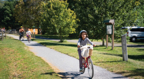 Bikers ride along the Virginia Creeper trail in Damascus VA. It's one of many outdoor destinations in Washington County to explore.