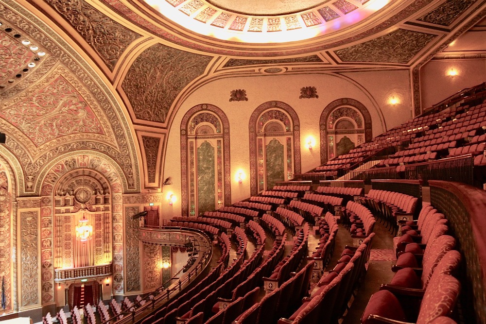 Red velvet seats line the balcony of the 90-year-old Embassy Theater in Fort Wayne, Indiana.