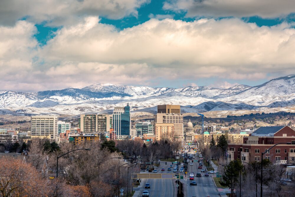 Winter day in Boise Idaho with capital and snow in the foothills. Boise is a place that has raised many Olympians.