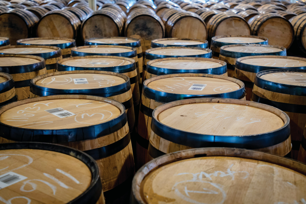 Tops of Bourbon Barrels in storage room