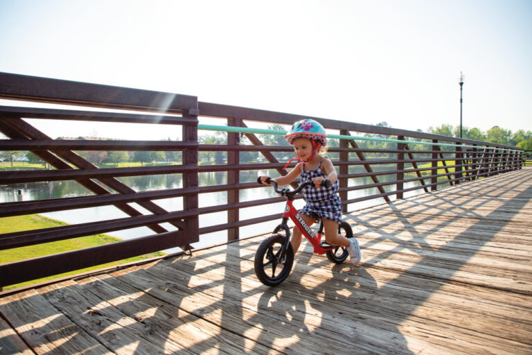 child on a Strider Bike