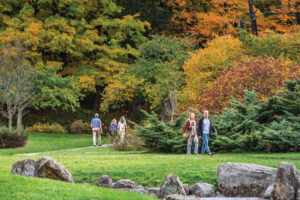 People walk through the Japanese Garden at the Dawes Arboretum in Newark, OH