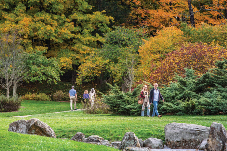 People walk through the Japanese Garden at the Dawes Arboretum in Newark, OH