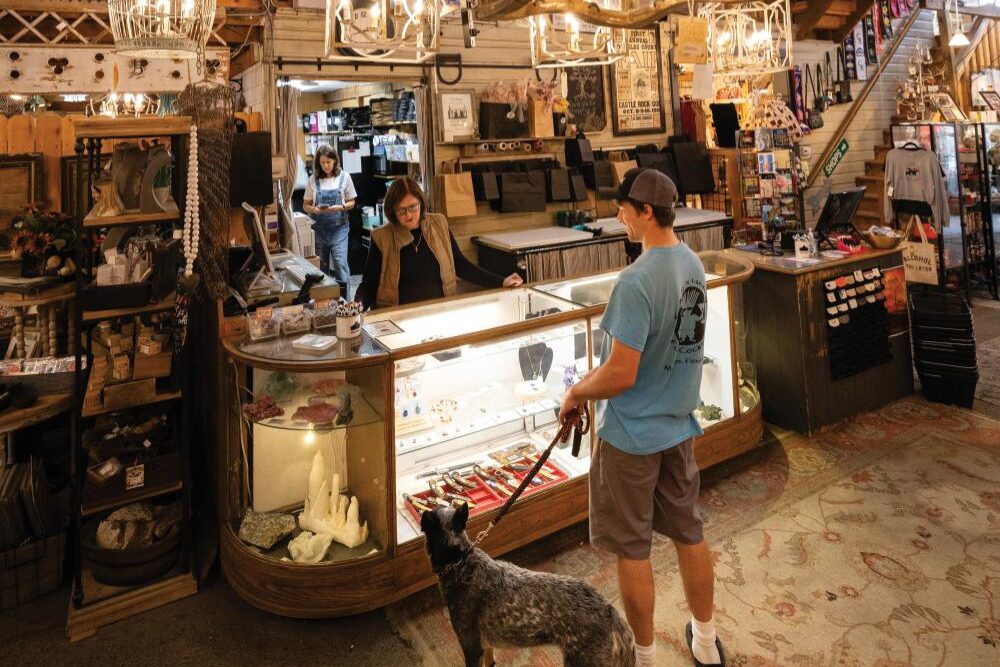 Visitors shop at The Barn Antiques and Specialty Shops in downtown Castle Rock, Colorado.