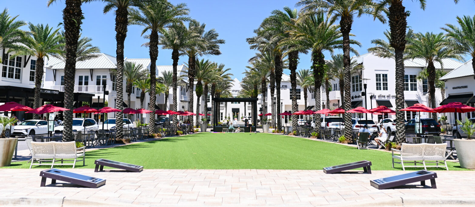 Palm trees, putting green and games at 30Avenue shopping at Inlet Beach, FL