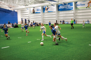 Children play soccer inside the BlueHawk Sports Complex in Overland Park, Kansas.