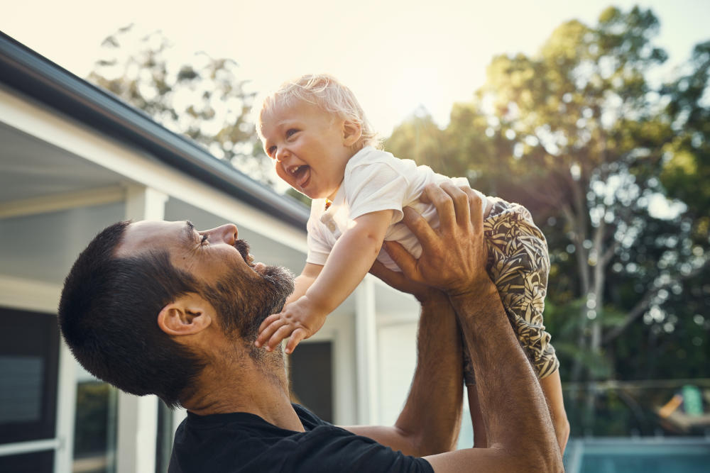 Man holding a baby