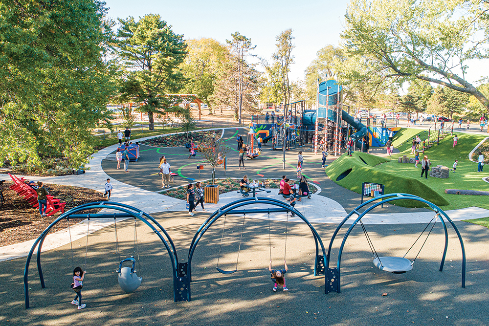 Children play on the playground at Strang Park in Overland Park, KS.