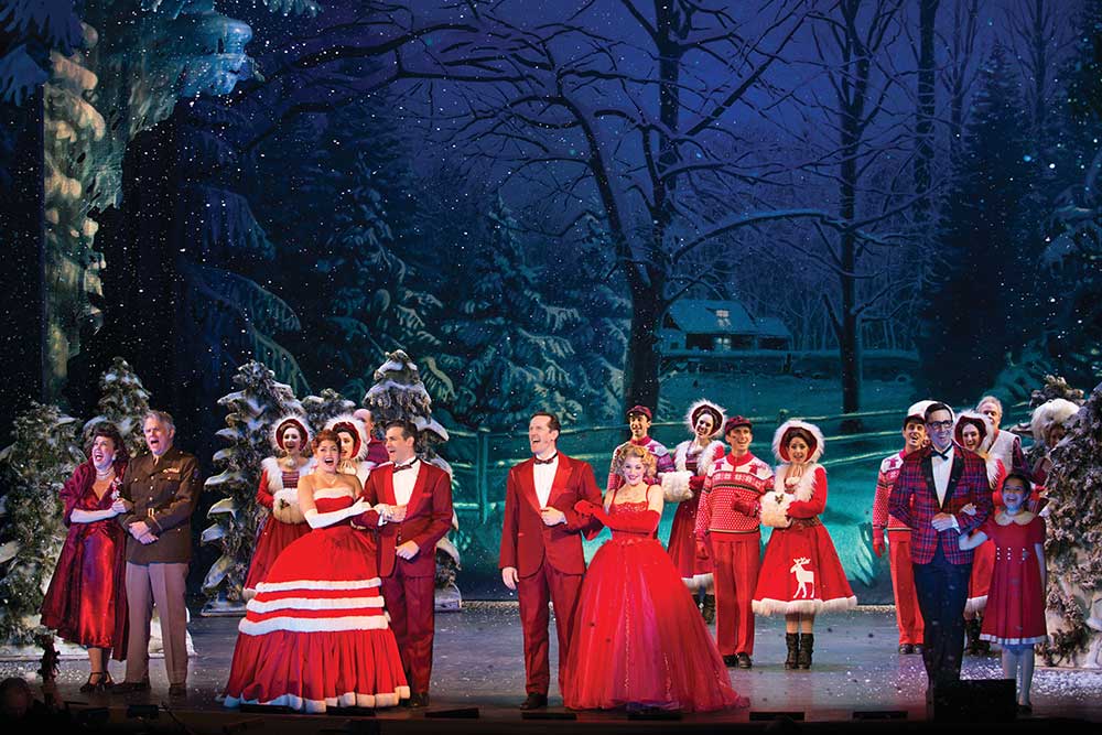 Performers on stage during a performance of White Christmas at The Music Hall.