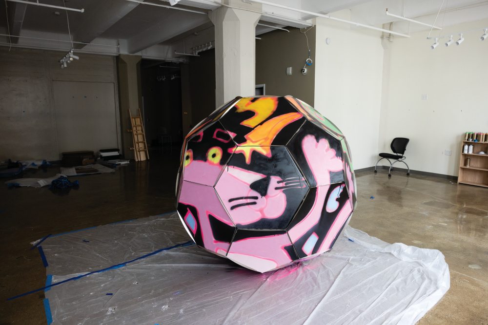 Soccer ball scupture artwork from The Art of the Game, painted by Katherine Bernhardt