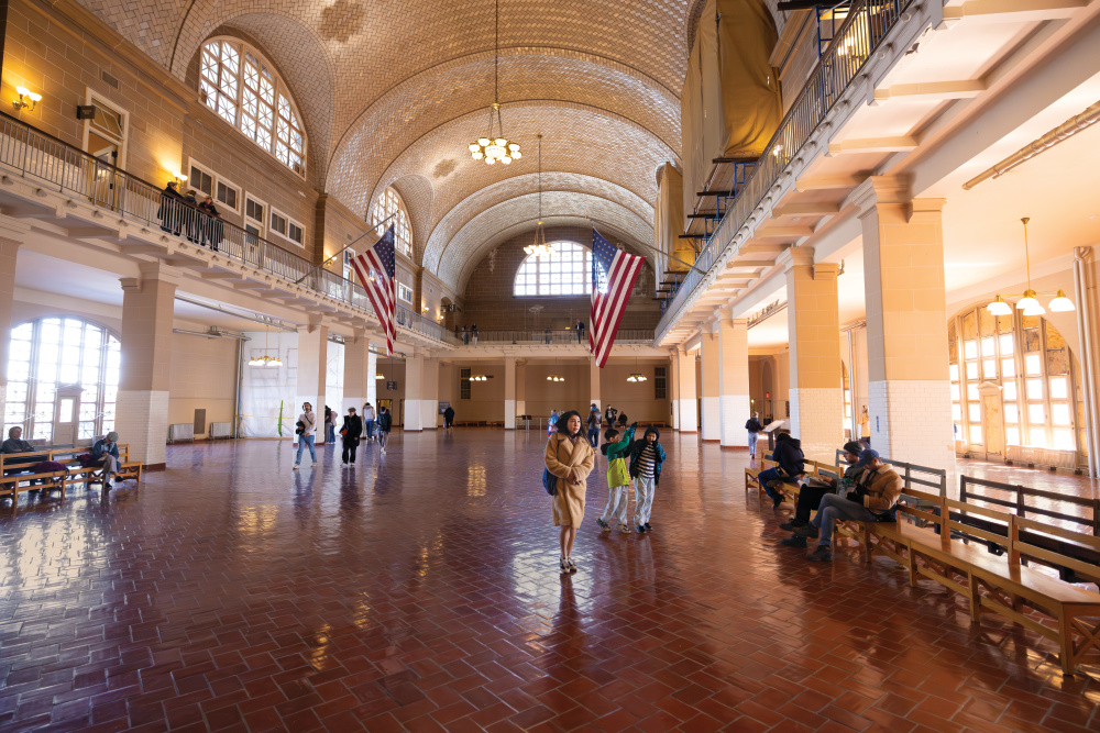 Visitors view the Registry Room at Ellis Island in Hudson County, New Jersey.