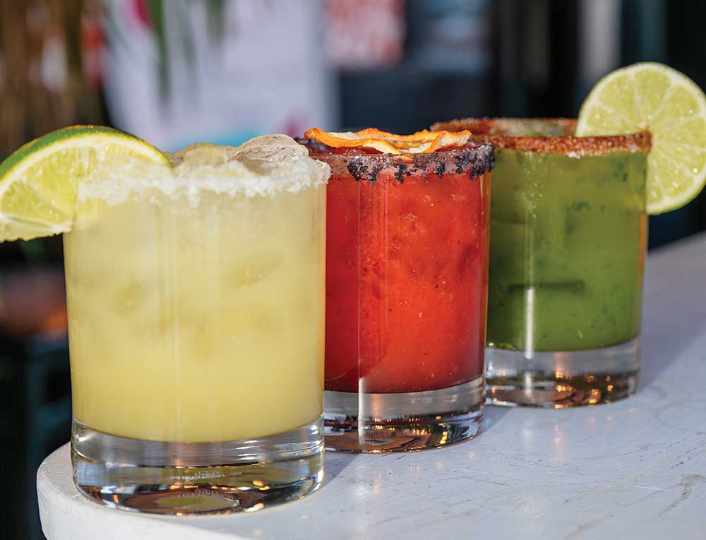 A line up of colorful cocktails at Vida Cantina.