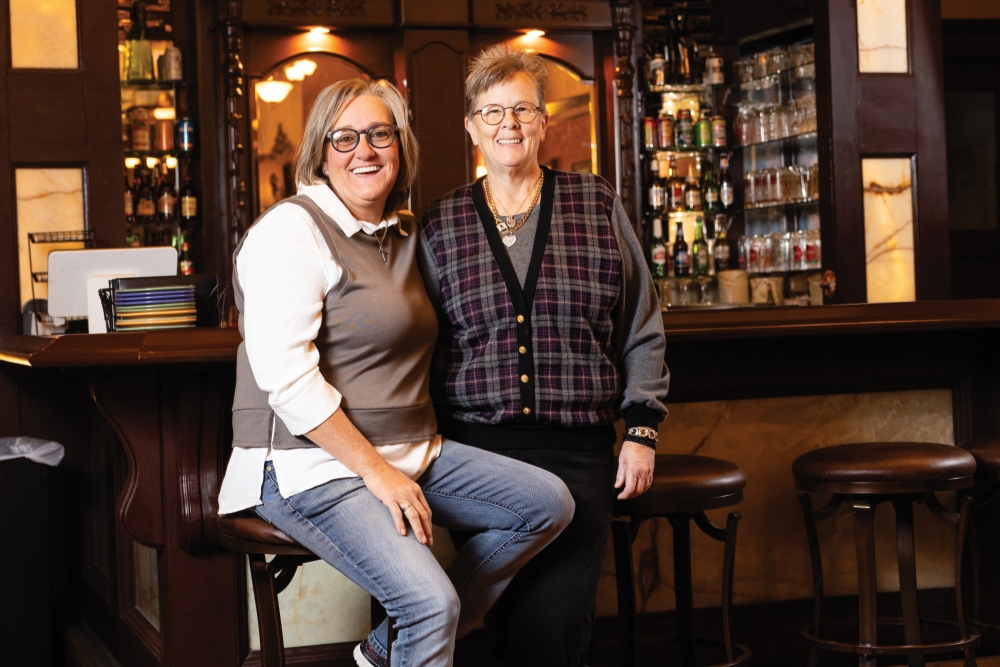 Ky Scott, right, and wife Jo Scott, left in the dining room of their new Twin Lions Wine Bar which is connected to Ky's American Bistro in downtown New Castle, Indiana.