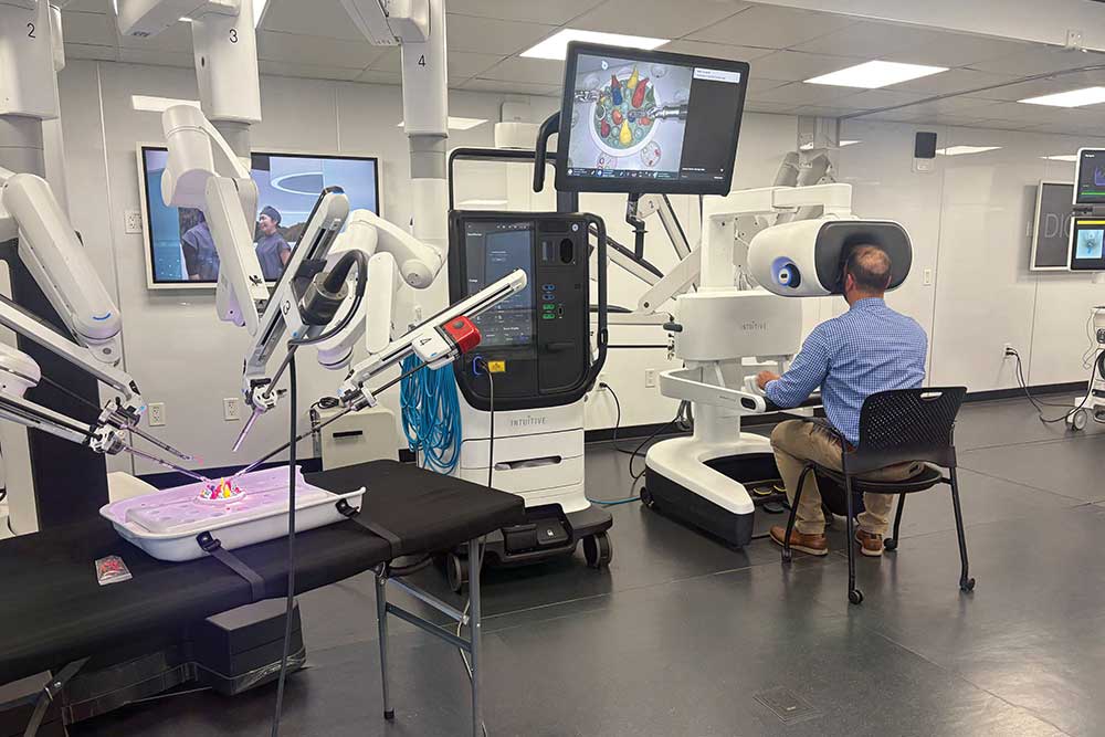 Dr. Antonio Lassaletta, thoracic surgeon at Portsmouth Regional Hospital, demonstrates the precision of the daVinci robot during a recent exhibit at Portsmouth Regional Hospital.