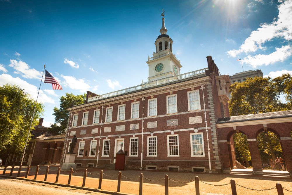 Exterior view of Independence Hall historic brick building in downtown Philadelphia Pennsylvania.