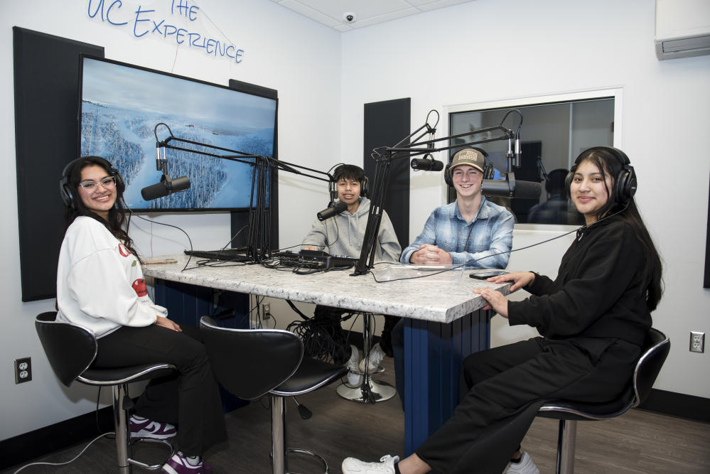 People recording a podcast