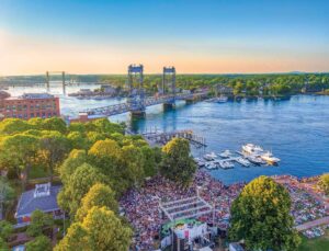 Aerial shot of a festival and the harbor in Portsmouth, NH.