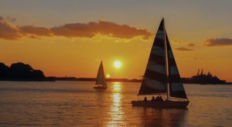 A sailboat on the Norfolk waterfront