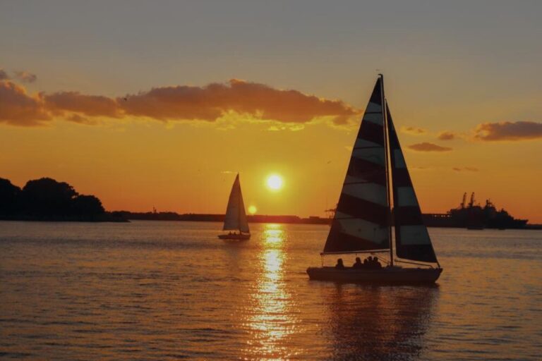 A sailboat on the Norfolk waterfront