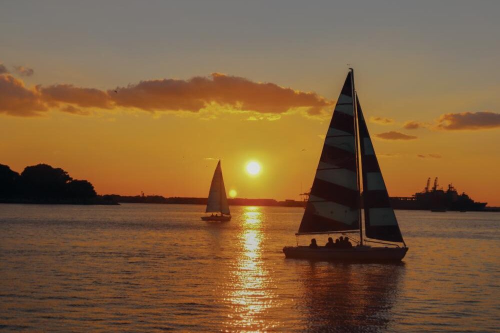 A sailboat on the Norfolk waterfront