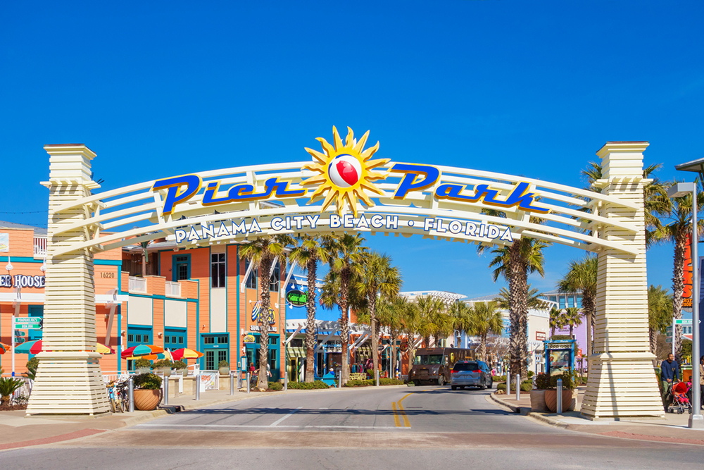 Sign of Pier Park in Panama City Beach on a sunny day. Pier Park is a colorful shopping and entertainment destination in Panama City Beach, Florida USA.