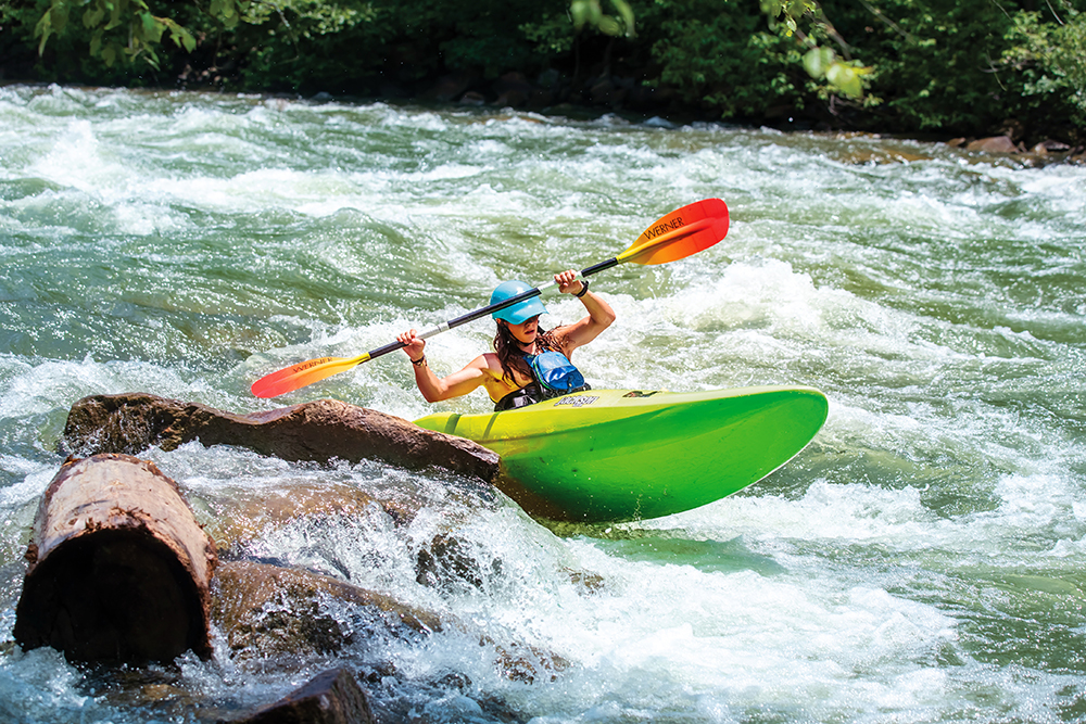 A whitewater kayaker plays in the rapids on the Ocoee River in Ducktown, TN, near Chattanooga.