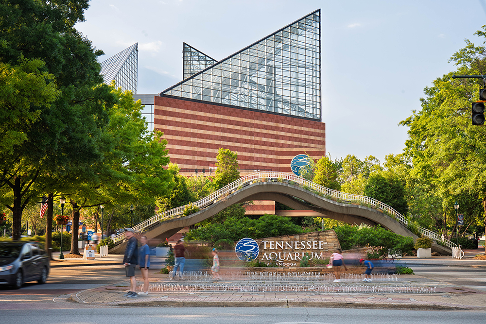 Children play in a fountain in front of the Tennessee Aquarium in downtown Chattanooga.