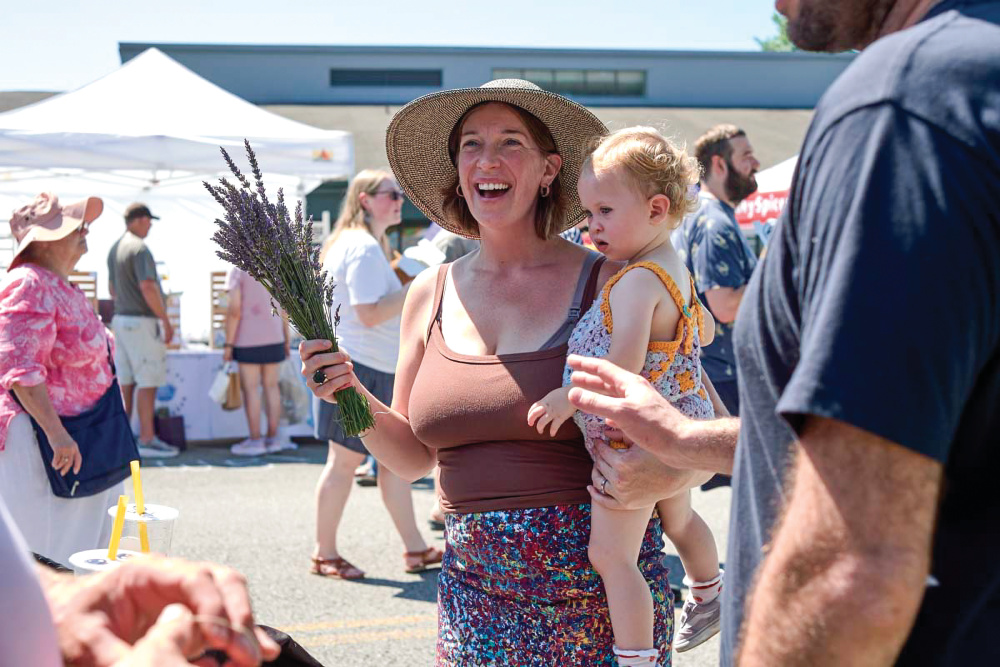 Woman and baby at a farmers market