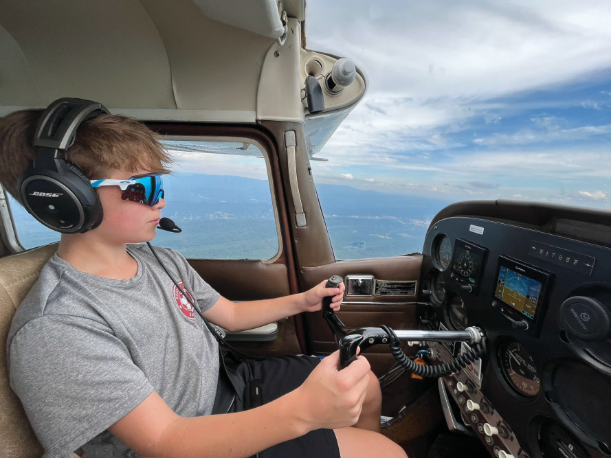 Boy flying aircraft