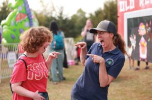 A child and a mentor participate in a custom, nature-based applied behavior analysis session at Cultivating Hope Farms.