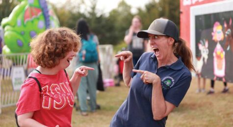 A child and a mentor participate in a custom, nature-based applied behavior analysis session at Cultivating Hope Farms.