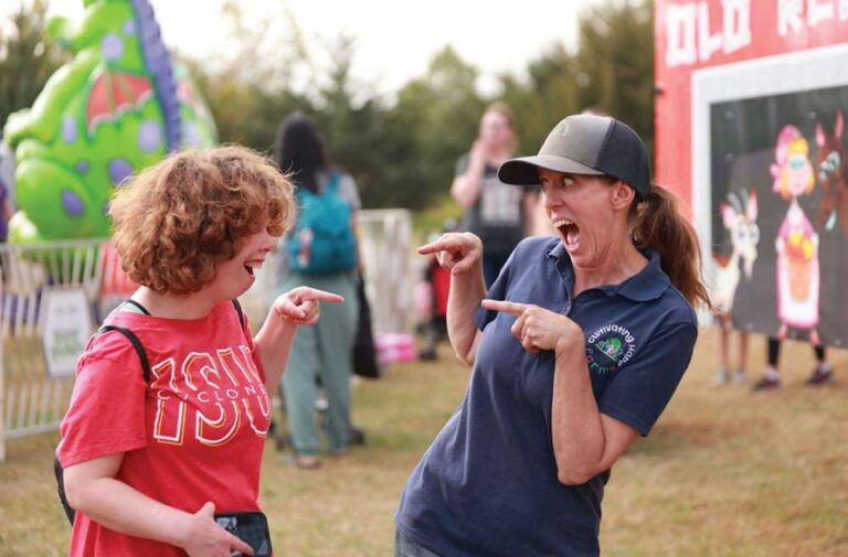 A child and a mentor participate in a custom, nature-based applied behavior analysis session at Cultivating Hope Farms.