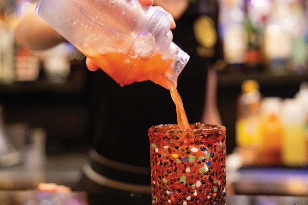 A bartender makes a Mexican Candy Cocktail at Aztec Urban MX in Tyler, Texas.