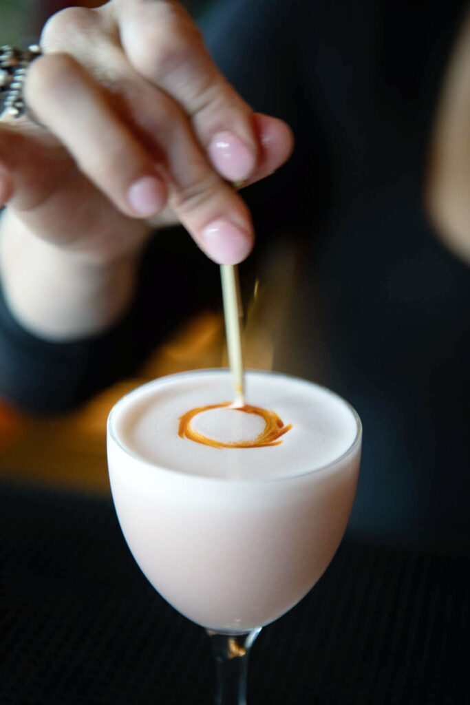 Raven Humphrey makes a Solei Levant drink at Calliope in Chattanooga, TN.