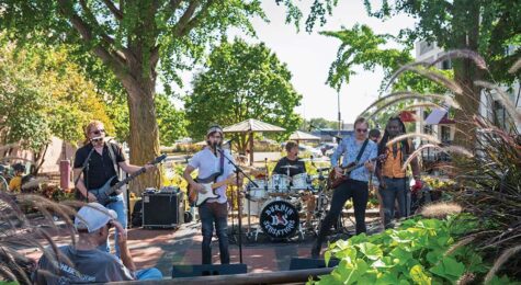Musicians perform at Downtown Ames Art Festival.