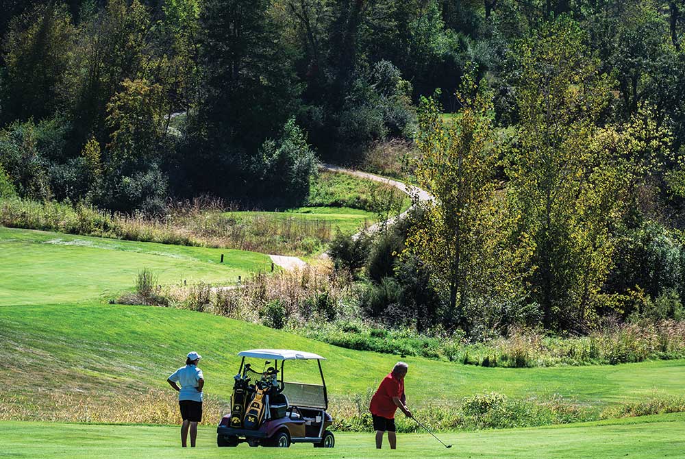 A group catches a round of golf at Honey Creek Golf Course in Boone, IA.