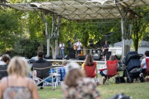 Concert in the Park Series at Reaney Park. Local band Blue Highway plays a Wednesday evening concert at Reaney Park in Pullman, Washington. These events are hosted by the Pullman Parks and Recreation.