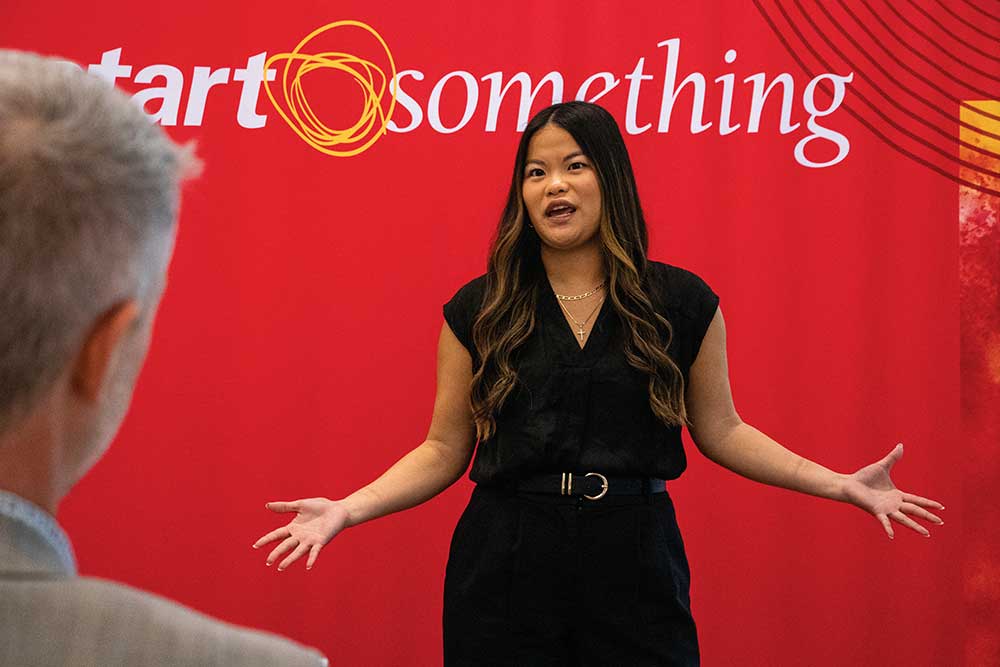 ISU student Anastasha Mealy working on an entrepreneurial business pitch at Iowa State University.