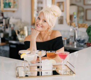 Cyndi Gryte owner of Juniper & Olive Co Parisian martini bar Jewell Iowa.