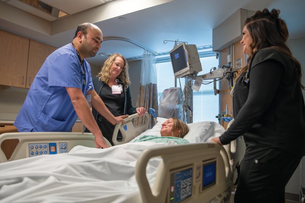 hospital staff attending a patient