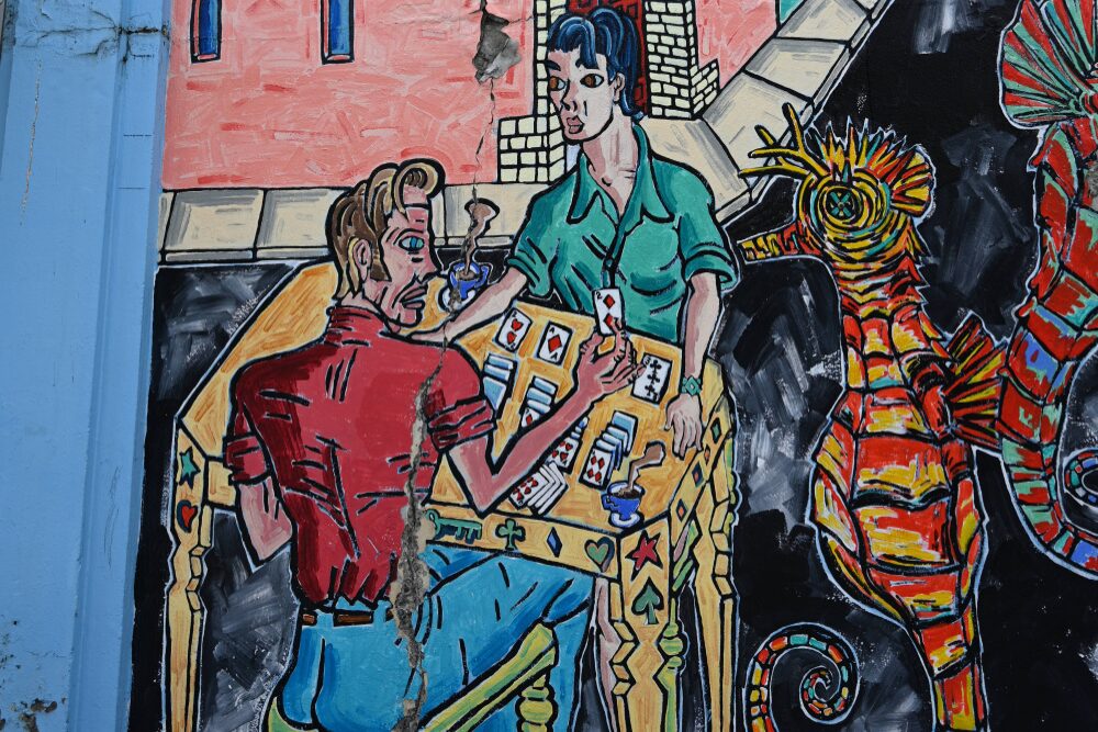 Murals on the side and back walls of Thomas Hammer coffee.