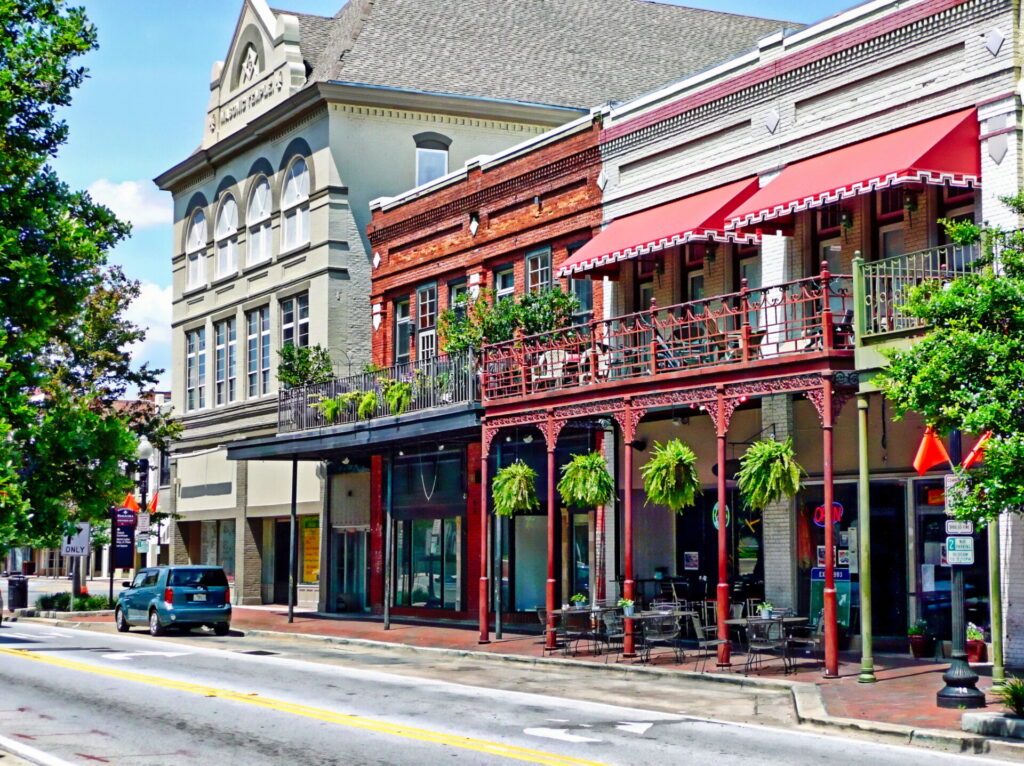 Pensacola's downtown street scene, featuring a mix of shops and businesses.